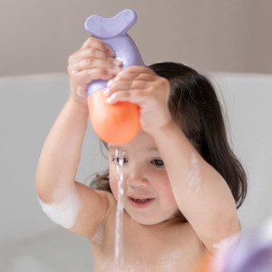 Jouet de bain arroseur en silicone Squeezi "Baleine" (12 mois et +) Quut