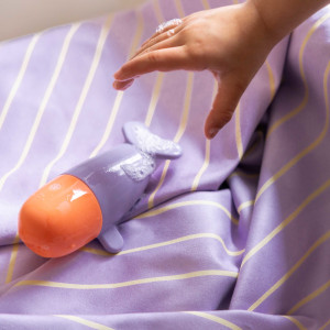 Jouet de bain arroseur en silicone Squeezi "Baleine" (12 mois et +) Quut