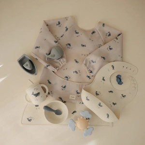 Bavoir manches longues imperméable (6-24 mois) "Baleines" Mushie